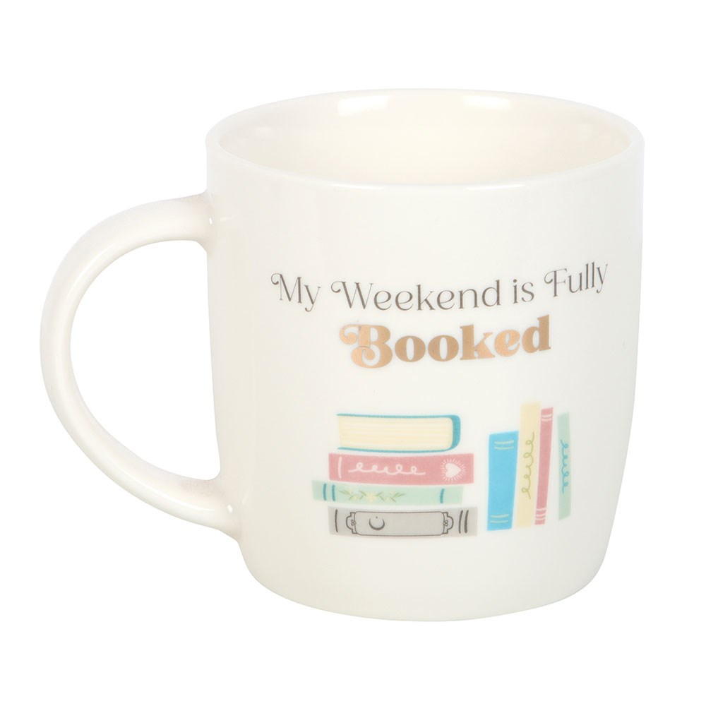 White mug with 'My Weekend is Fully Booked' text and book illustrations on a white background