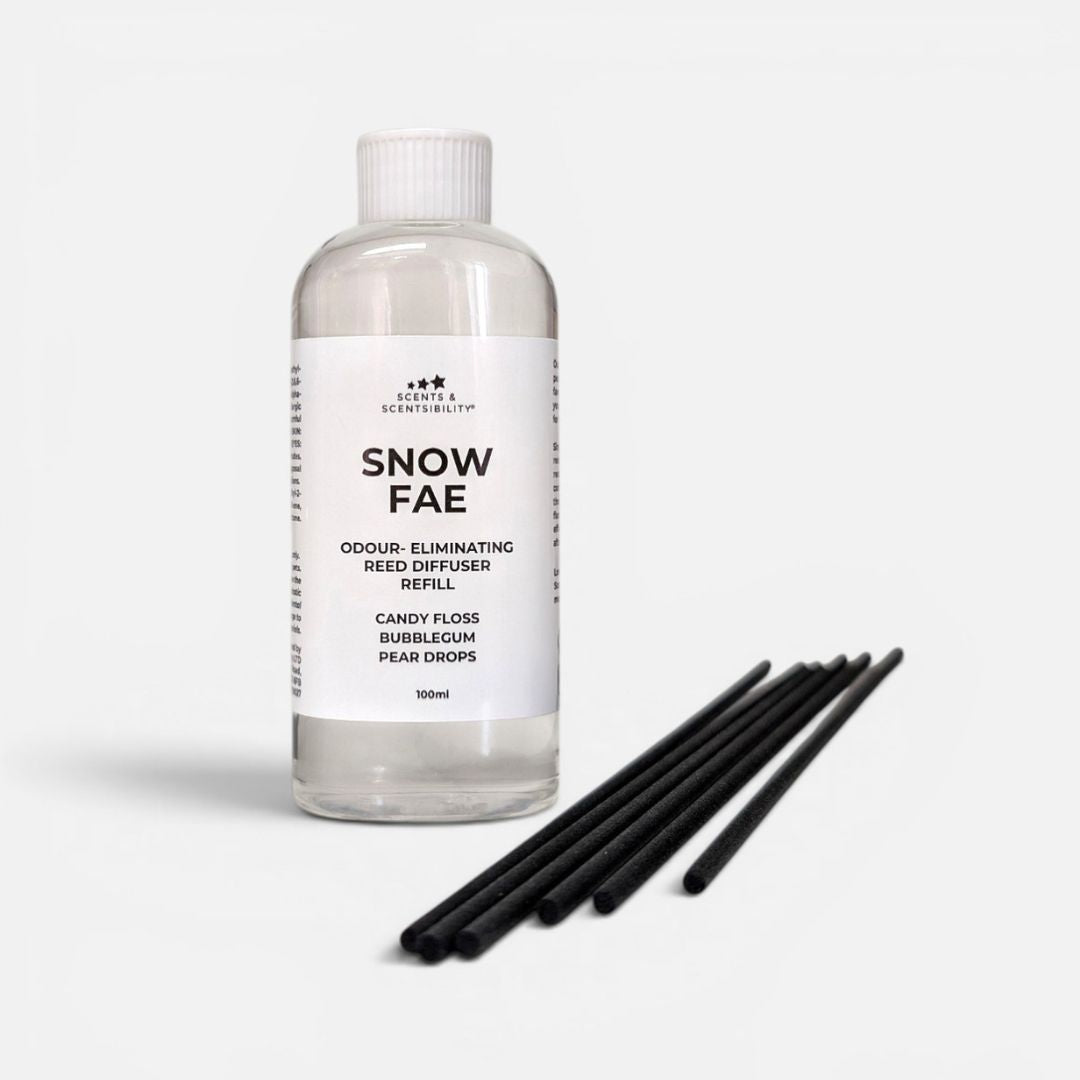 Snow Fae diffuser refill bottle with black sticks on a white background