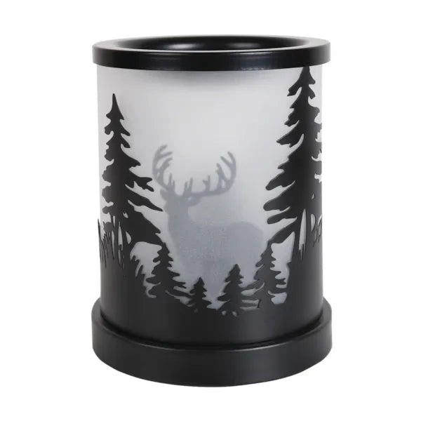 Decorative wax melt warmer with stag silhouette design on a wooden surface