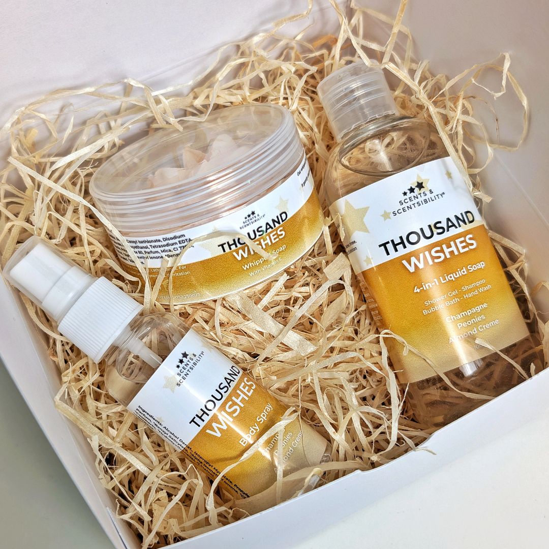 Skincare products from 'Thousand Wishes' brand in a box with straw-like material.