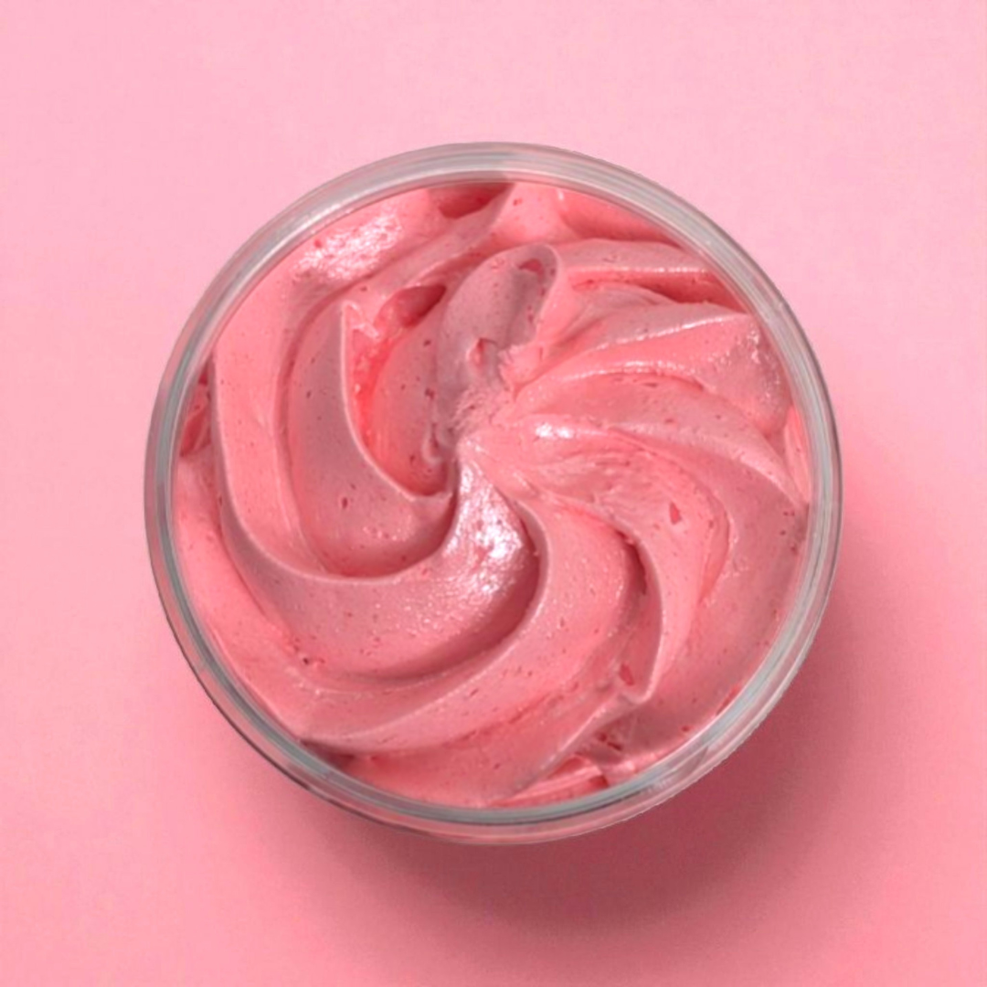 Very Cherry red whipped soap in a clear tub on a pink background
