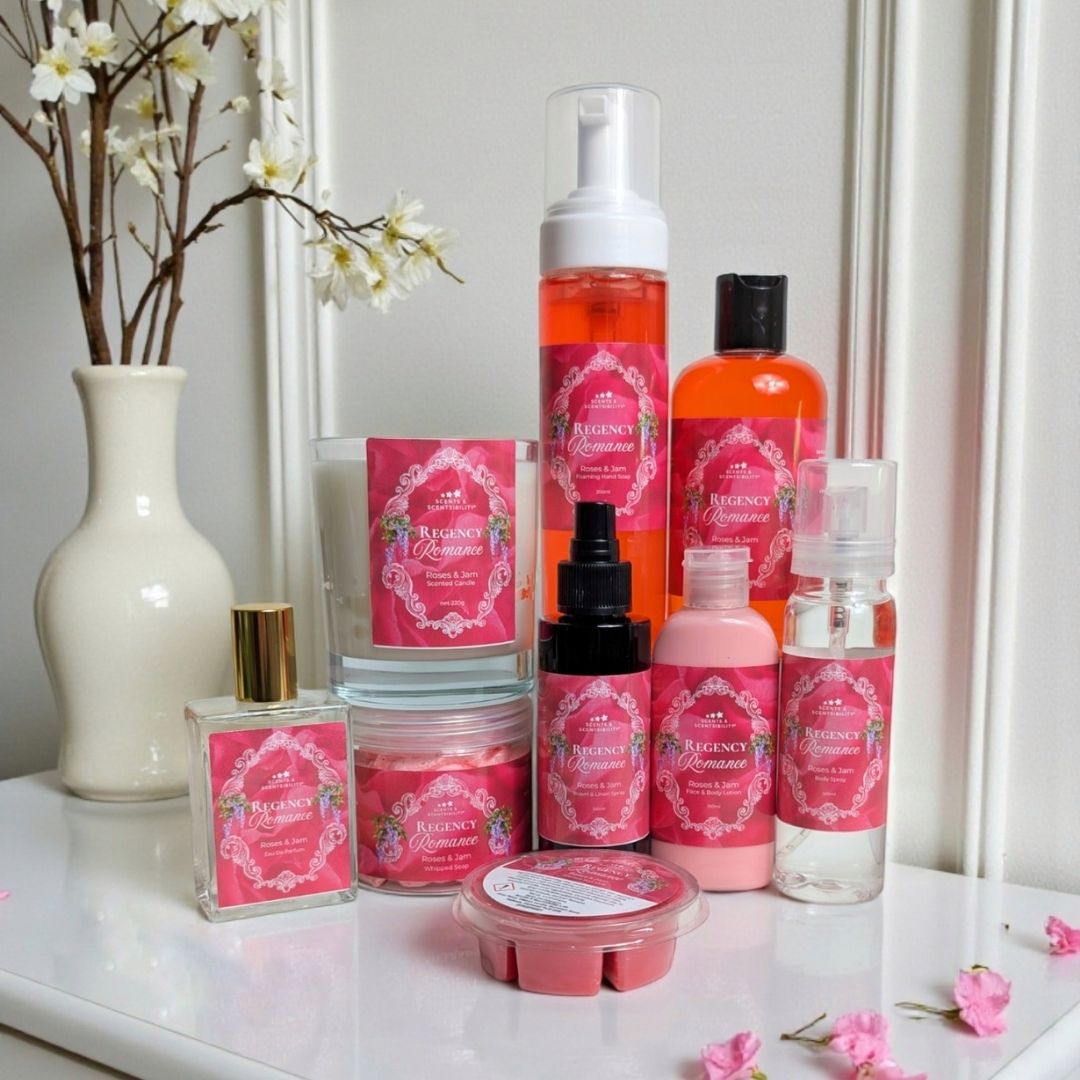 A collection of products, labeled Regency Romance on a white dressing table