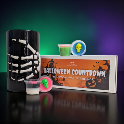 Halloween-themed wax melt blends with a skeleton wax melt burner and decorative packaging.