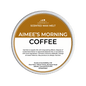 Scented wax melt container labeled 'Aimee's Morning Coffee' on a green background