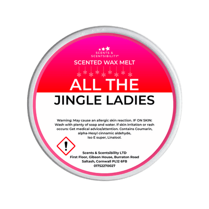 Scented wax melt container labeled 'All the Jingle Ladies' on a green background