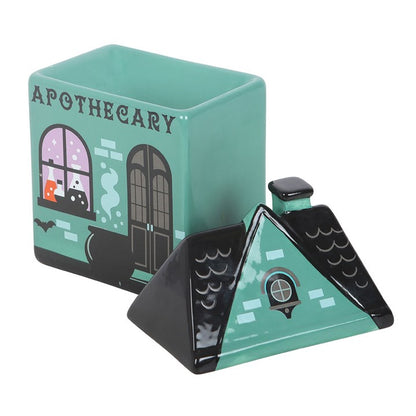 Green apothecary house-shaped wax melt & oil burner on a white background