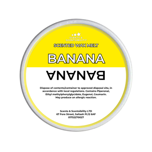 A round tub of Scents & Scentsibility Banana Scented Wax Melt, featuring a bright yellow and white label with black and white text.