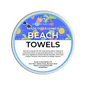 A round tub of Scents & Scentsibility 'Beach Towels' scented wax melt, featuring a colorful tropical beach-themed label on a white container, set against a solid dark green background.