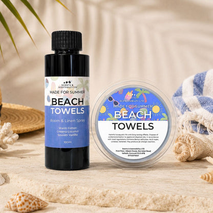 A bottle of Beach Towels Room Spray with a matching Wax Melt