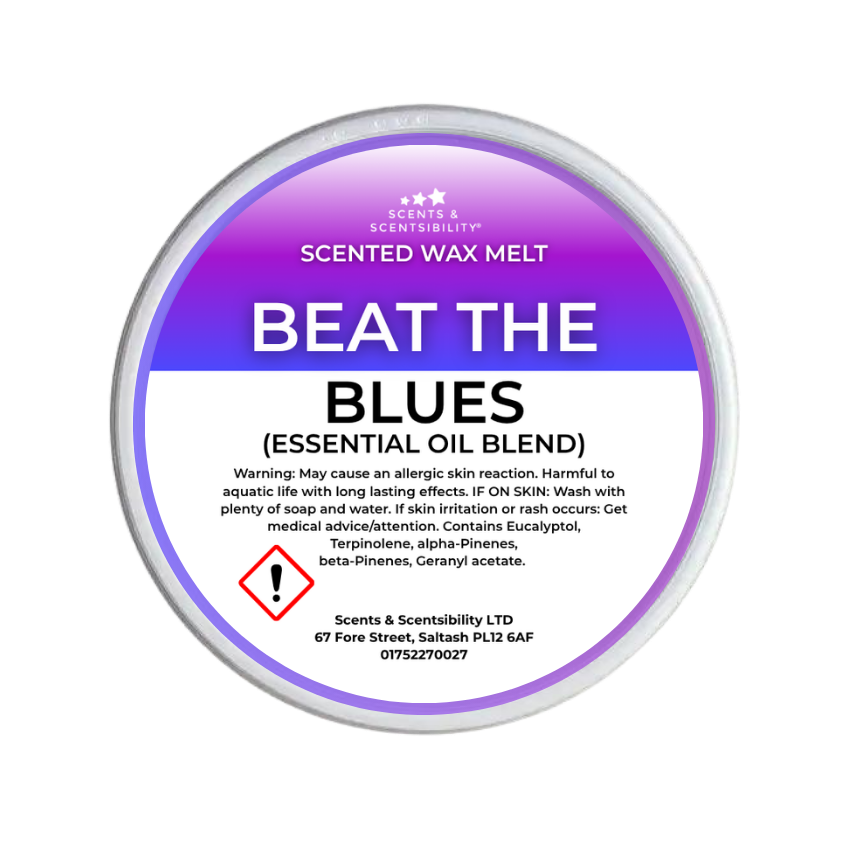 A round tub of Scents & Scentsibility 'Beat the Blues' scented wax melt, featuring a purple-to-white gradient label with product details and a hazard symbol.