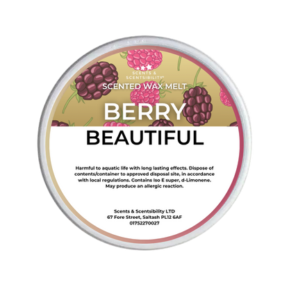 A round tub of Scents & Scentsibility 'Berry Beautiful' scented wax melt, featuring a label with blackberries and raspberries on a gold background, set against a plain white background.