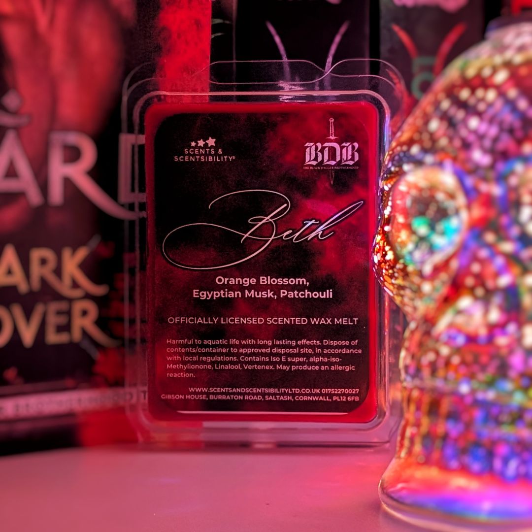 Scented wax melt packaging with 'Beth' flavor label in a colorful setting