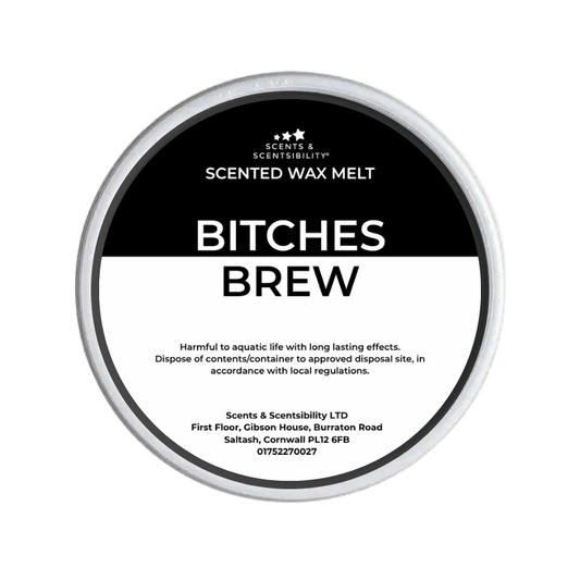 Scented wax melt container labeled 'Bitches Brew' with Scents & Sensibility branding on a green background.