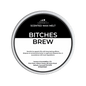 Scented wax melt container labeled 'Bitches Brew' with Scents & Sensibility branding on a green background.