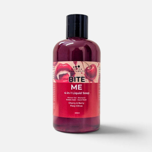 A 250ml bottle of Bite Me 4-in-1 Liquid Soap by Scents & Scentsibility, featuring a glossy translucent dark red bottle, a black cap, and a red label with cherry and lips graphics, set against a light grey background.