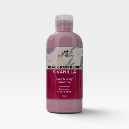 A 100ml plastic bottle of Scents & Scentsibility Face & Body Smoothie in Black Raspberry & Vanilla scent, filled with a dusty purple liquid, set against a light gray background.
