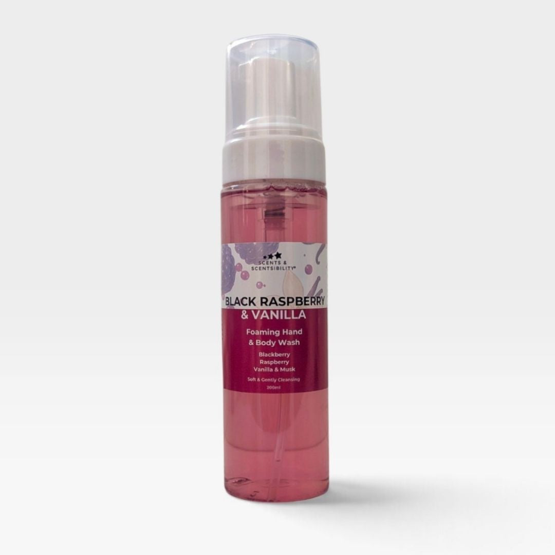 A 100ml pump bottle of Black Raspberry & Vanilla Foaming Hand & Body Wash, filled with pink liquid, set against a light gray background.