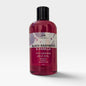 A 250ml bottle of Scents & Scentsibility Black Raspberry & Vanilla 4-in-1 Liquid Soap, featuring a translucent deep red bottle and a black cap, set against a light gray background.