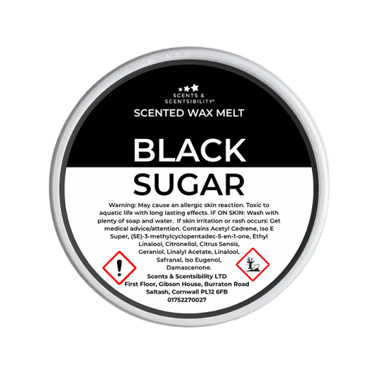 Scented wax melt container labeled 'Black Sugar' with branding on a green background