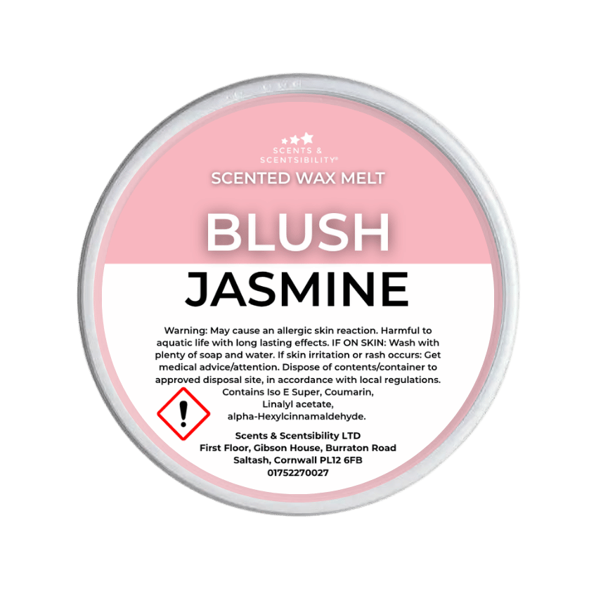 Scented wax melt container labeled 'Blush Jasmine' on a green background
