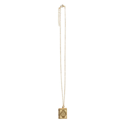 Gold necklace with a rectangular pendant on a white background