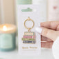 Book Worm Keyring in packaging