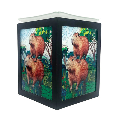 Decorative wax warmer with capybara design on a white background