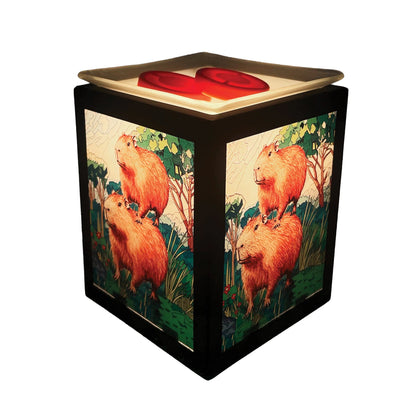Cube-shaped wax melt warmer with capybara design on a white background