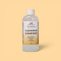 Bottle of Cashmere Comfort multi-purpose disinfectant cleaner concentrate on a beige background