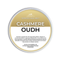 A round tub of Scents & Scentsibility Scented Wax Melt in the variant 'Cashmere Oudh'. The container features a white and gold label with black text, set against a clean white background.