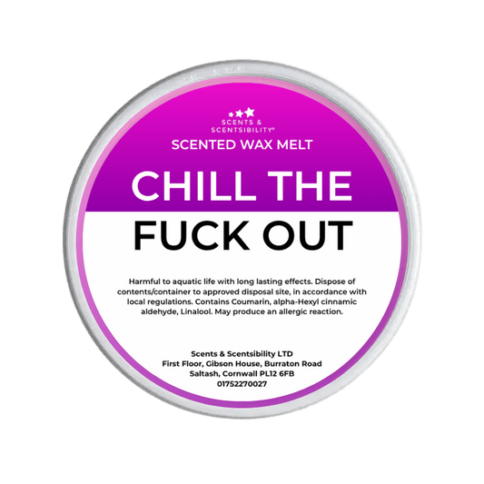 Scented wax melt container with a purple label on a green background