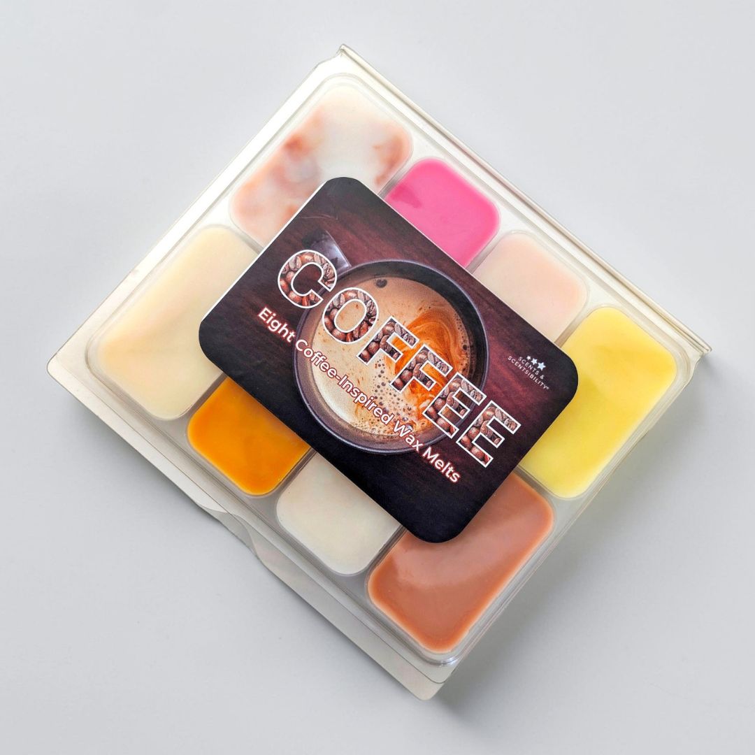 Pack of coffee-scented wax melts with a visible brand logo on a light grey background