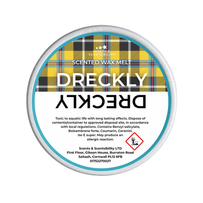 Dreckly scented wax melt packaging with Cornish Tartan on a green background