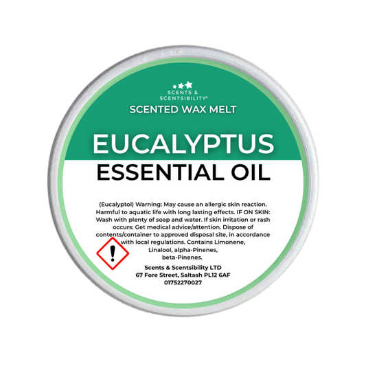 A round tub of Scents & Scentsibility Scented Wax Melt Eucalyptus Essential Oil, featuring a green and white label with product details and a warning symbol.