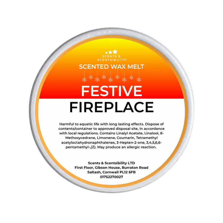 Scented wax melt container with 'Festive Fireplace' label on a green background