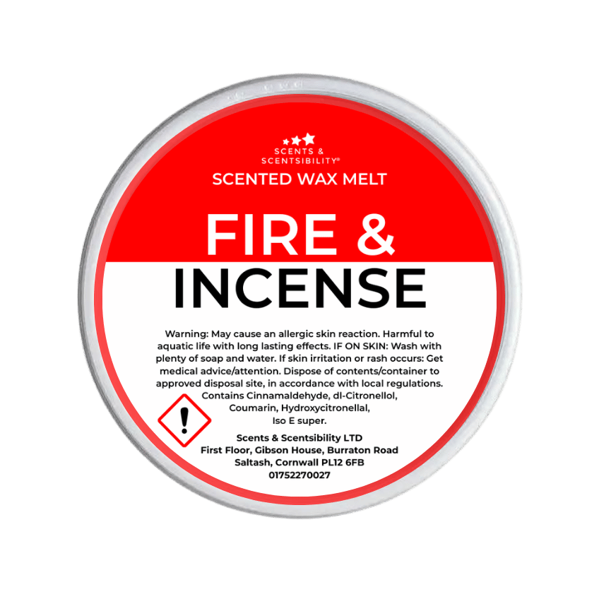 Scented wax melt container with red label on a green background