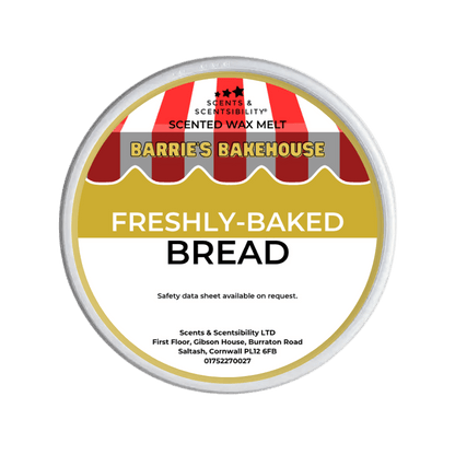 Scented wax melt container labeled 'Freshly-Baked Bread' by Barrie's Bakehouse on a green background