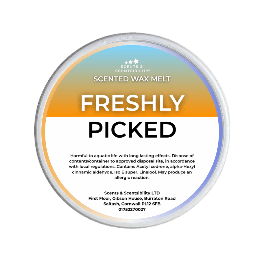 A  Scents & Scentsibility Freshly Picked Scented Wax Melt, featuring a white label with orange and blue gradient accents, set against a solid dark green background.