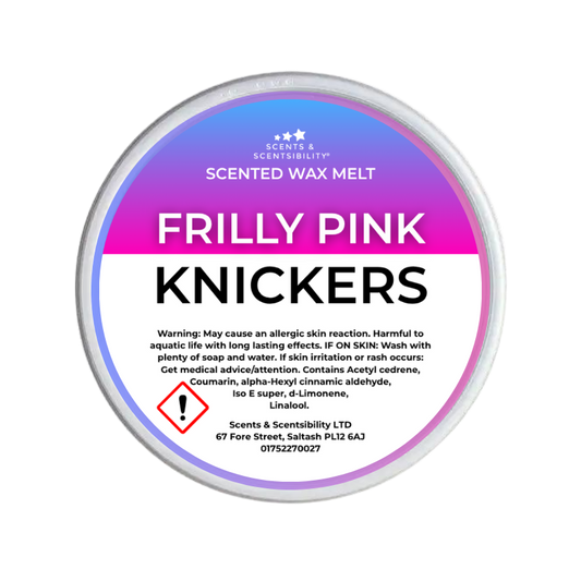 A round tub of Scents & Scentsibility 'Frilly Pink Knickers' scented wax melt, featuring a colorful label with a pink-to-purple gradient and black text on a white background.