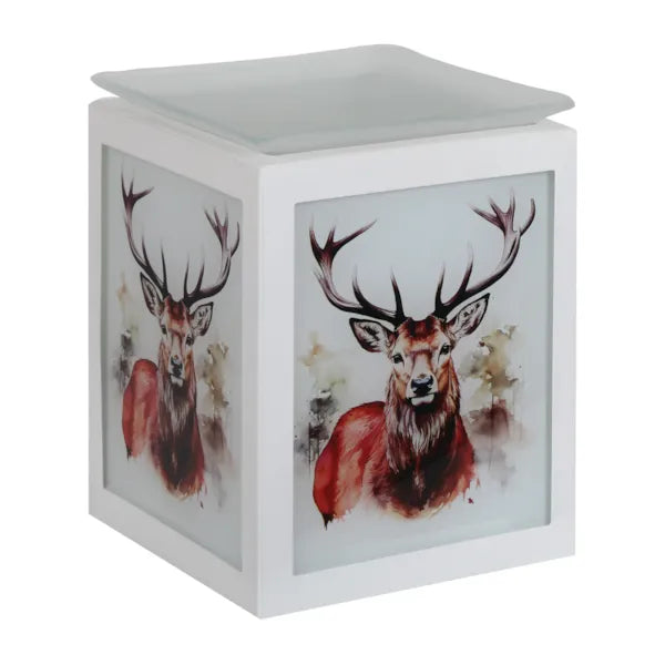 A white cube-shaped wax warmer with a glass lid and printed watercolor stag illustrations on the front panels, shown on a plain white background.