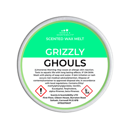 Scented wax melt container labeled 'Grizzly Ghouls' on a green background