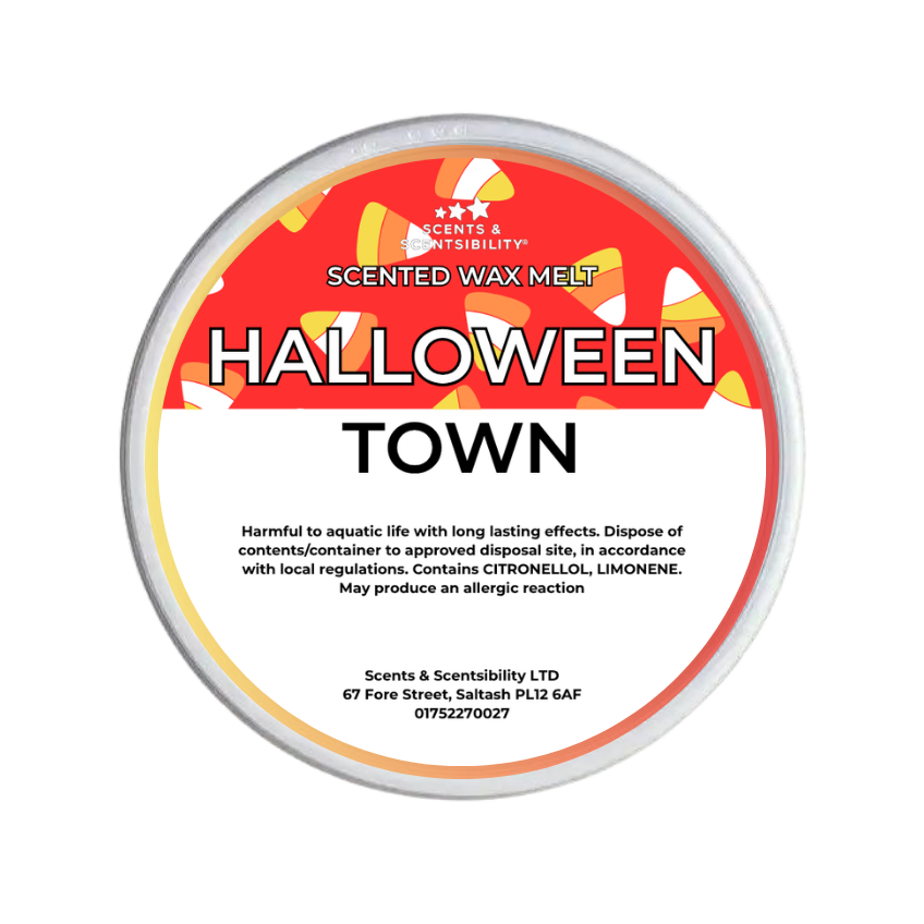 A round tub of Scents & Scentsibility 'Halloween Town' scented wax melt, featuring a red, white, and orange label with candy graphics.