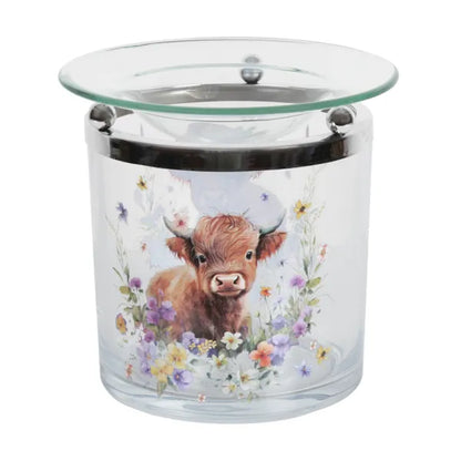 Glass wax melt burner with a highland cow design on a white background