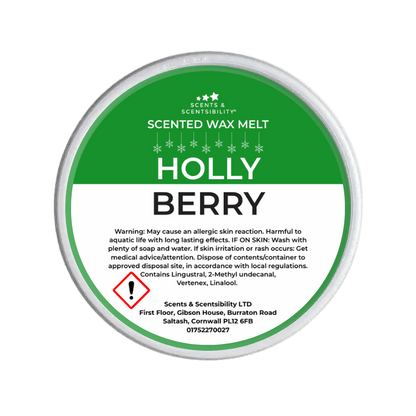 Scented wax melt container labeled 'Holly Berry' with green and white design.