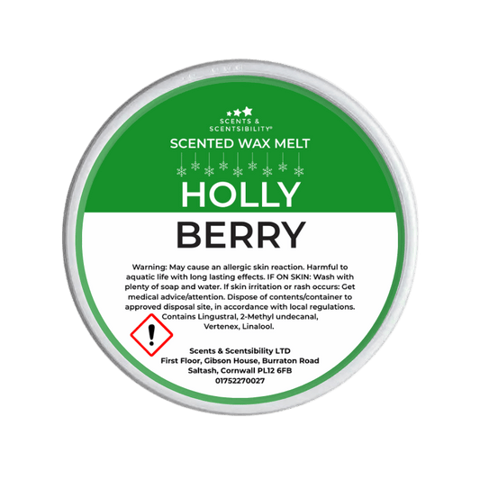 Scented wax melt container labeled 'Holly Berry' with green and white design.