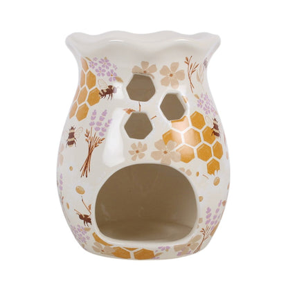 Honey Bee Fluted Ceramic Wax Warmer & Oil Burner showing the large tealight opening, honeycomb-shaped cut-outs and pretty bee and floral design.