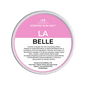 Scented wax melt container with pink label on a green background