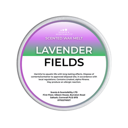 Scented wax melt container labeled 'Lavender Fields' on a green background