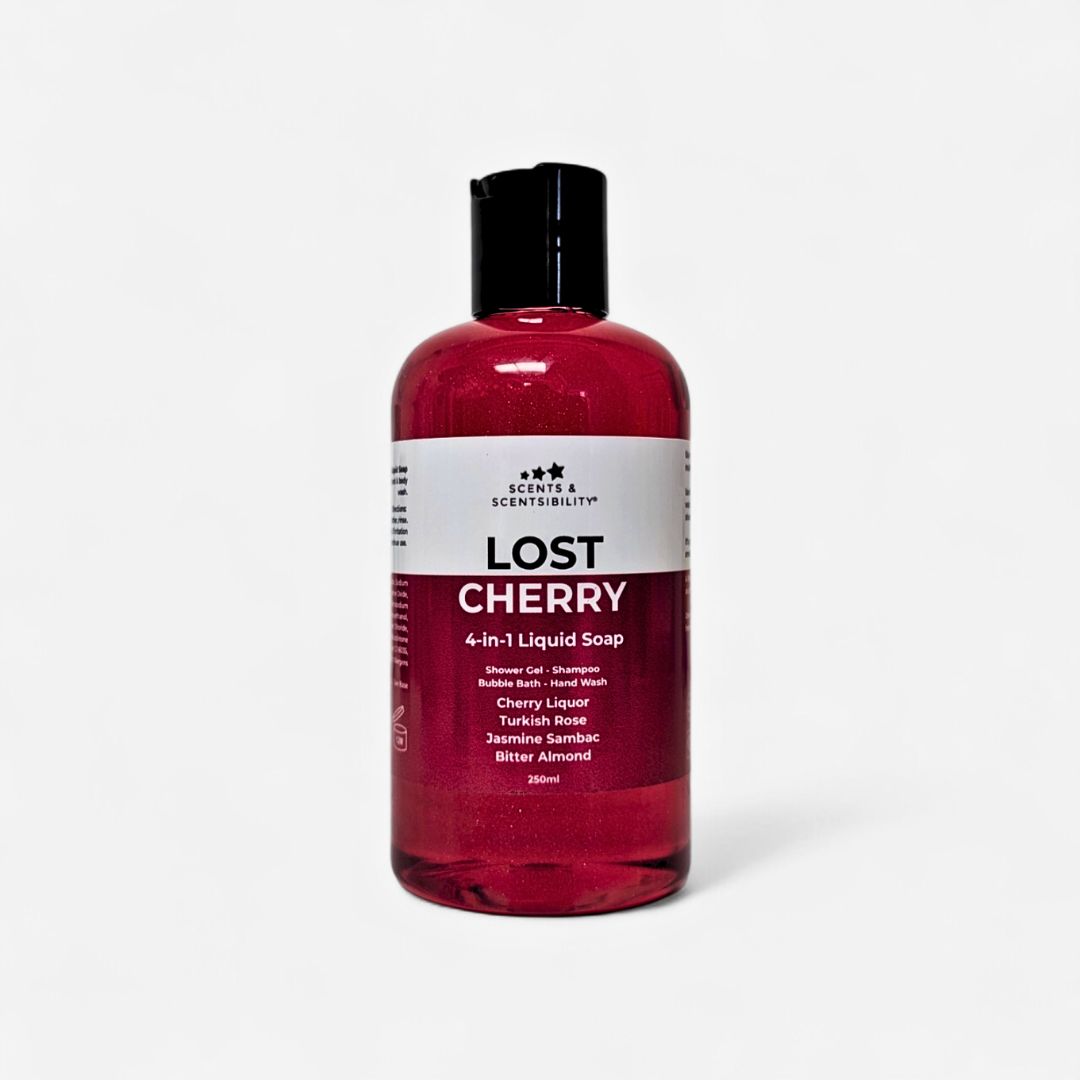 A plastic bottle of burgundy coloured liquid soap with a label saying 'Lost Cherry' on a white background