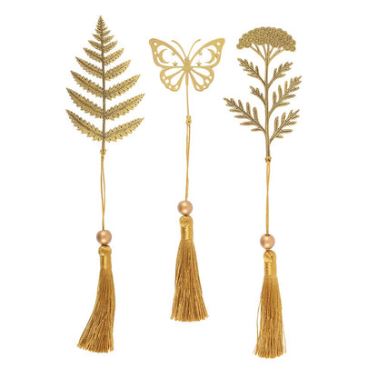 Three decorative bookmarks with tassels on a white background